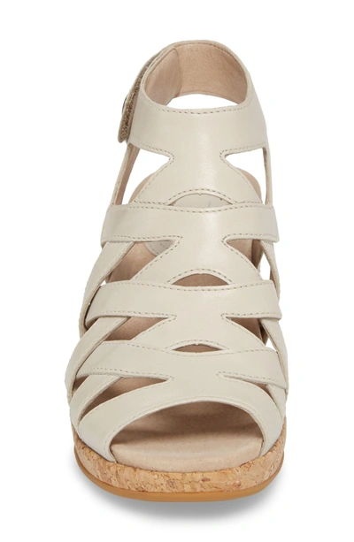 Shop Dansko Cecily Caged Wedge Sandal In Ivory Leather