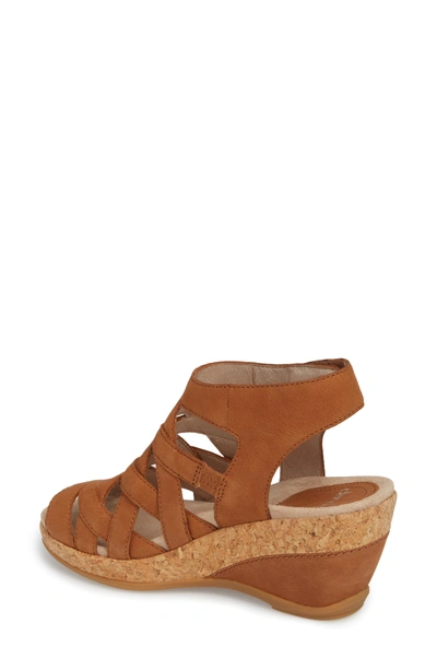 Shop Dansko Cecily Caged Wedge Sandal In Camel Milled Nubuck Leather