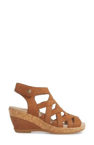 Shop Dansko Cecily Caged Wedge Sandal In Camel Milled Nubuck Leather