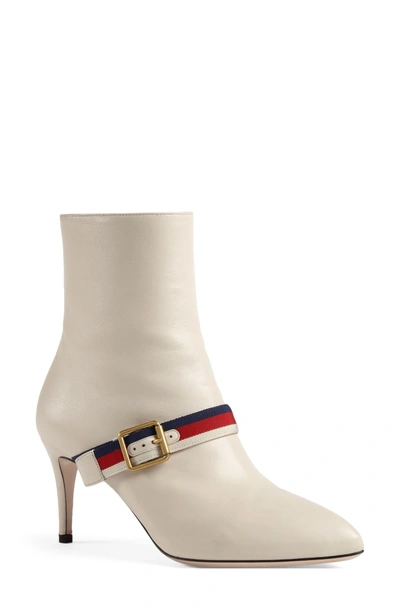 Shop Gucci Sylvie Strap Ankle Boot In White Leather