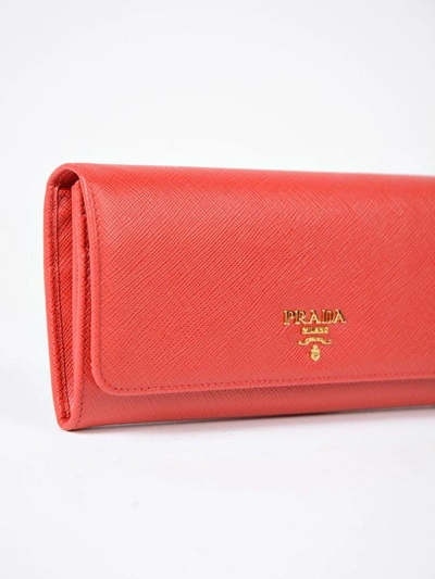 Shop Prada Saffiano Continental Wallet In Rosso