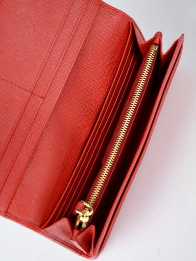 Shop Prada Saffiano Continental Wallet In Rosso
