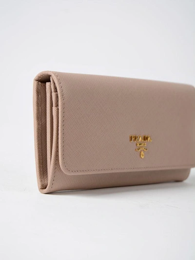 Shop Prada Saffiano Continental Wallet In Cipria