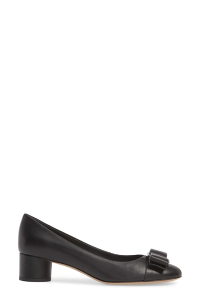 Shop Ferragamo Ivrea Bow Pump In White/ Black