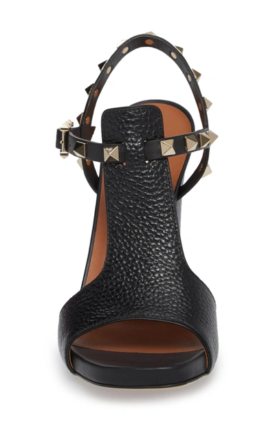 Shop Valentino Rockstud T-strap Sandal In Black Leather