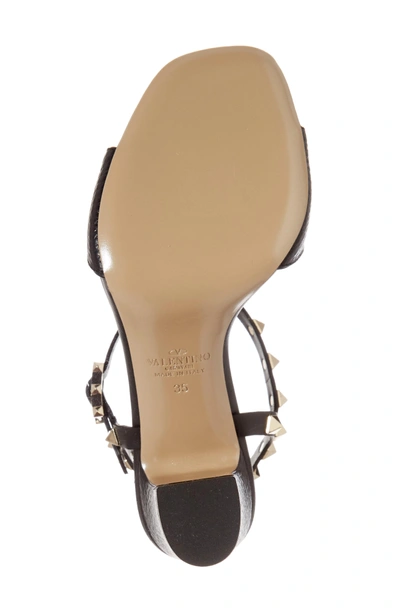 Shop Valentino Rockstud T-strap Sandal In Black Leather