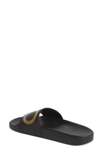 Shop Ferragamo Groove Logo Slide Sandal In Black/ Gold