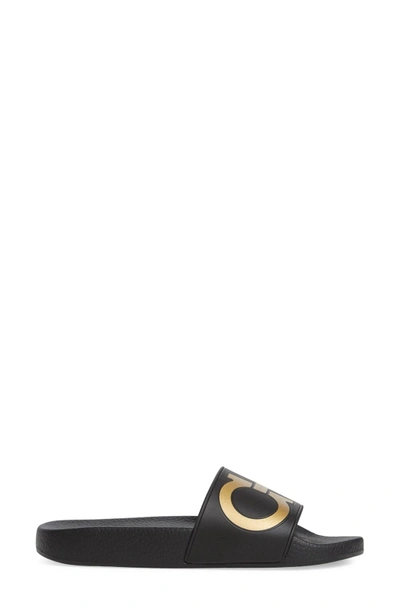 Shop Ferragamo Groove Logo Slide Sandal In Black/ Gold