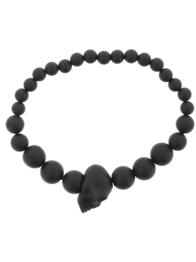 Shop Alexander Mcqueen Skull Ball Bracelet In Black