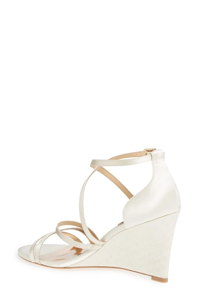 Shop Badgley Mischka Bonanza Strappy Wedge Sandal In Ivory Satin