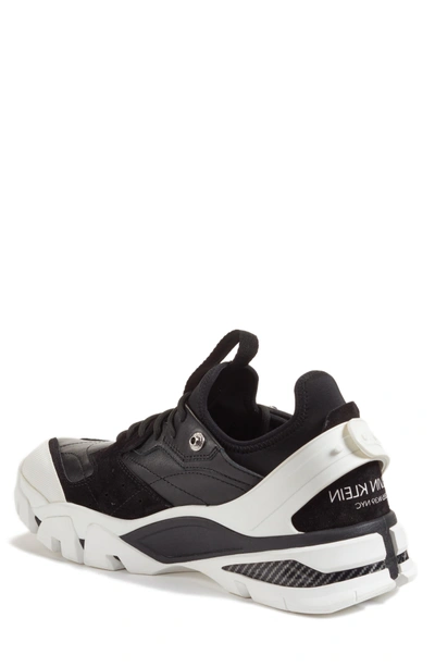 Shop Calvin Klein 205w39nyc Carla Sneaker In White/ Black