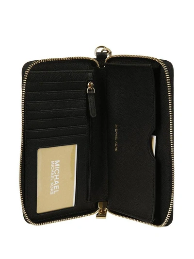 Shop Michael Kors Mercer Smartphone Zip Around Wallet In Nero-oro