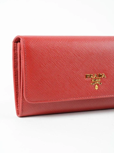 Shop Prada Saffiano Continental Wallet In 68z Fuoco