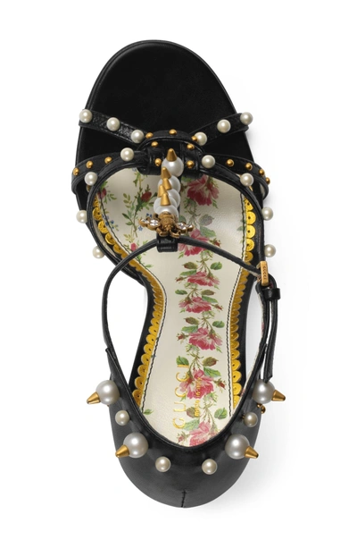 Shop Gucci Regina Embellished T-strap Sandal In Black