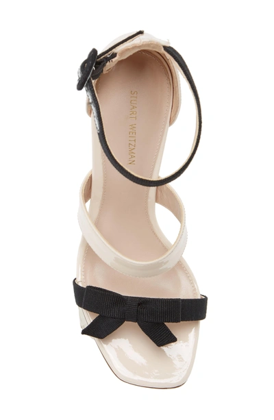 Shop Stuart Weitzman Ally Bow Sandal In Cashew Gloss