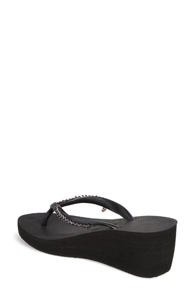 Shop Havaianas High Metal Grega Wedge Flip Flop In Black