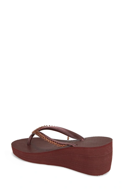 Shop Havaianas High Metal Grega Wedge Flip Flop In Grape Wine