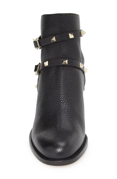 Shop Valentino Rockstud Bootie In Black