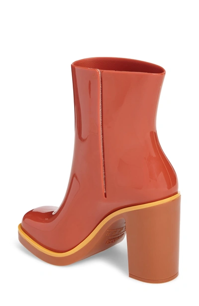Shop Melissa Classic Rain Boot In Red Orange
