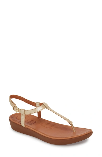 Shop Fitflop Tia Thong Sandal In Pale Gold Leather