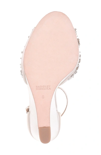 Shop Badgley Mischka Sarah T-strap Sandal In Ivory Satin