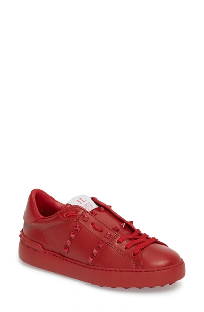 Shop Valentino Rockstud Sneaker In Red