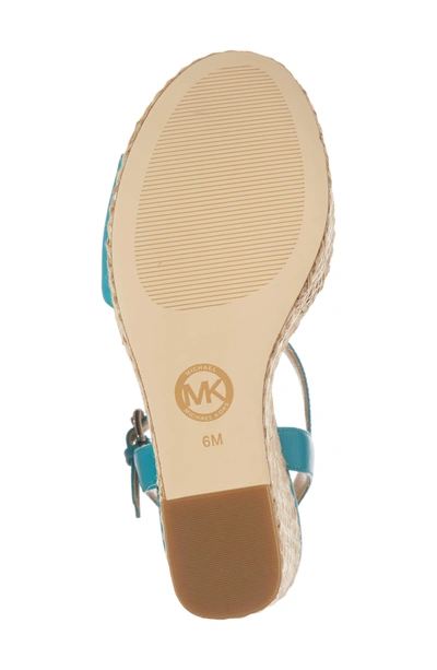 Shop Michael Michael Kors Fisher Wedge In Tile Blue Leather