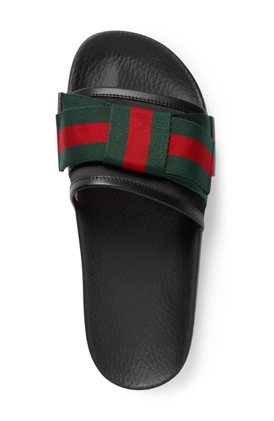 Shop Gucci Pursuit Bow Slide Sandal In Black