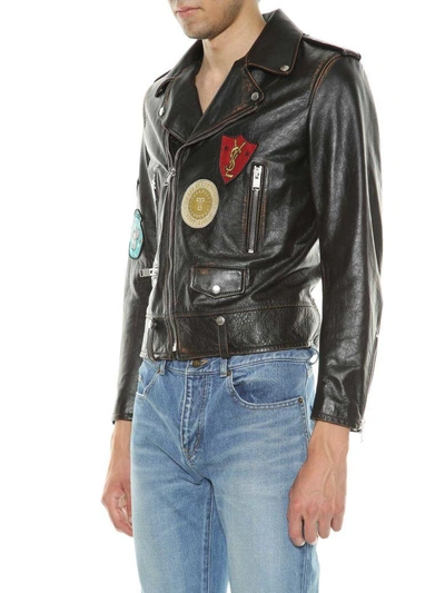 Shop Saint Laurent Biker Jacket With Multicolor Patches In Noir-cognac-multicolor