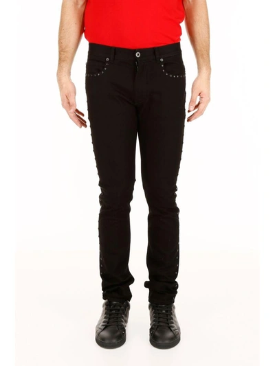 Shop Versace Studded Jeans In Nero|nero