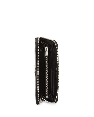 Shop Saint Laurent Ysl Monogram Large Zip Wallet In Grained Leather In Black