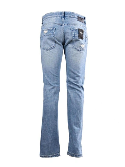 Shop Fendi Distressed Patch Jeans In F0uvindaco