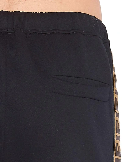 Shop Fendi Trousers In Black