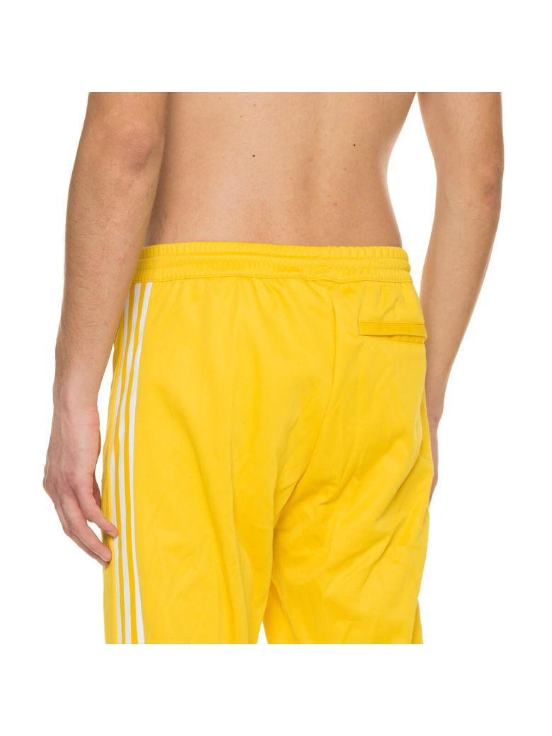 adidas beckenbauer pants yellow