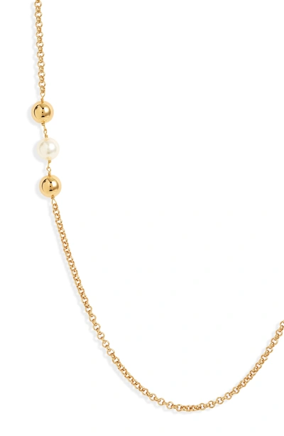 Shop Tory Burch Imitation Pearl Station Necklace In Ivory / Tory Gold