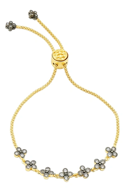 Shop Freida Rothman Adjustable Clover Bracelet In Gold/ Silver