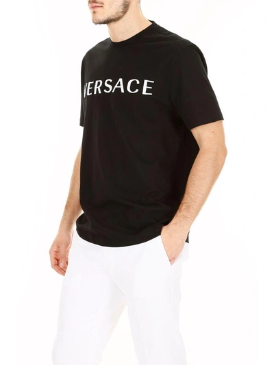 Shop Versace T-shirt With Embroidered Logo In Nero-bianconero