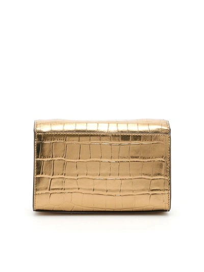 Shop Michael Michael Kors Ruby Clutch In Gold|metallico