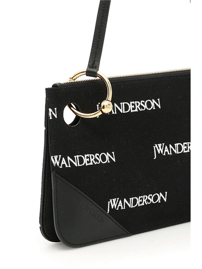 Shop Jw Anderson Logo Pierce Clutch In Basic