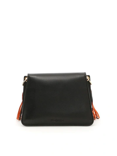 Shop Jw Anderson Mini Pierce Leather Fringe Bag In Black (black)