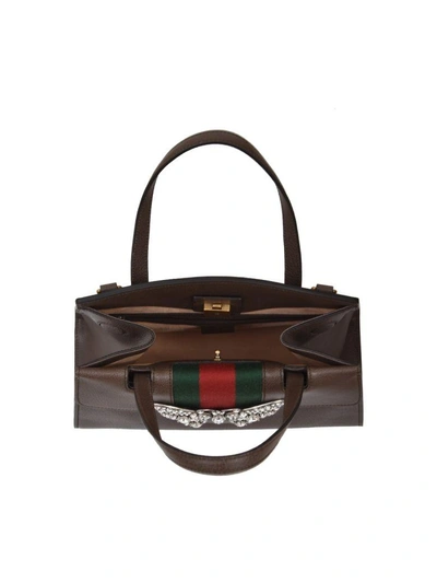 Shop Gucci Totem Bag In Brown