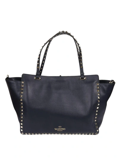 Shop Valentino Rockstud Trapeze Tote In Mblu