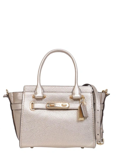 Shop Coach Swagger 21 Bag In Oro