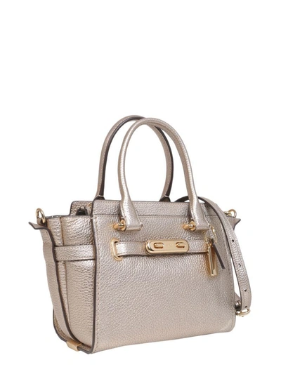 Shop Coach Swagger 21 Bag In Oro