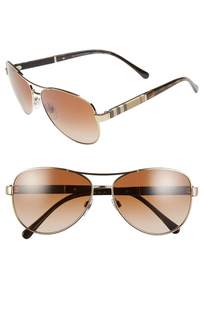 Shop Burberry 59mm Aviator Sunglasses - Matte Gold