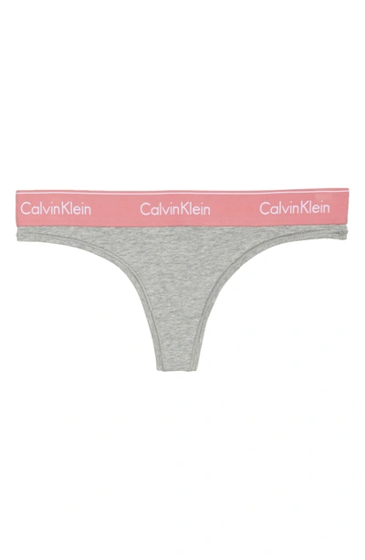 Shop Calvin Klein Logo Thong In Grey Heather Sensation
