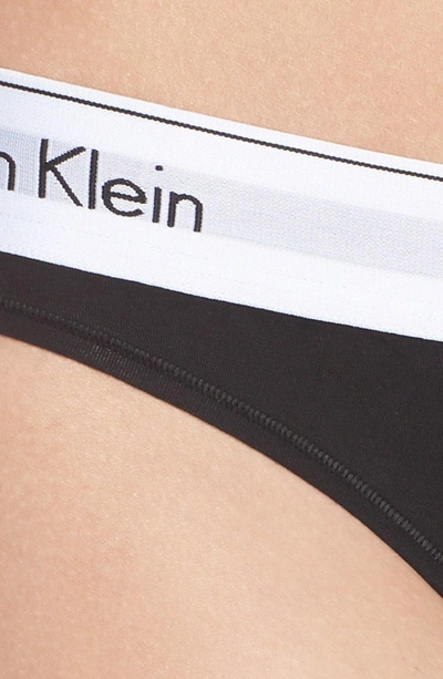 Shop Calvin Klein Logo Thong In Black Empower