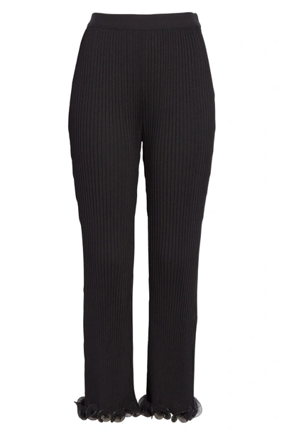 Shop Givenchy Ribbed Ruffle Hem Pants In Black