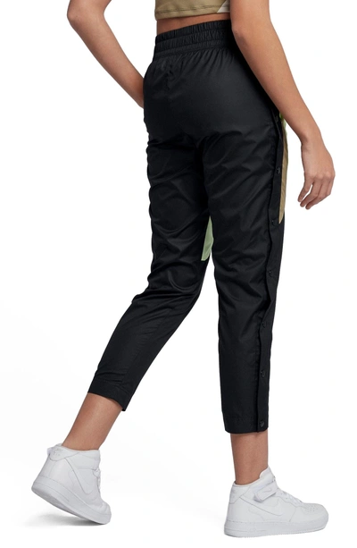 Shop Nike Sportswear Tearaway Woven Pants In Black/black