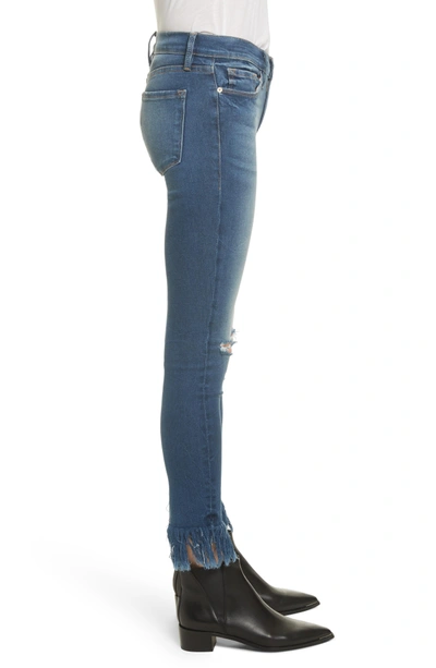 Shop Frame Le Skinny De Jeanne Shredded Raw Hem Jeans In Lambeth